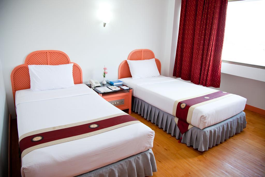 Thumrin Hotel Trang Zimmer foto